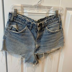 Vintage destroyed Levi’s 501 denim shorts
